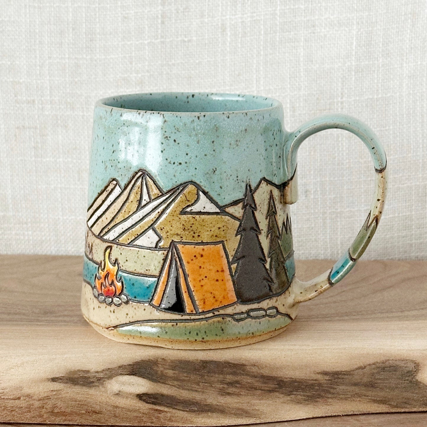orange tent mug - right orientation (12 oz)