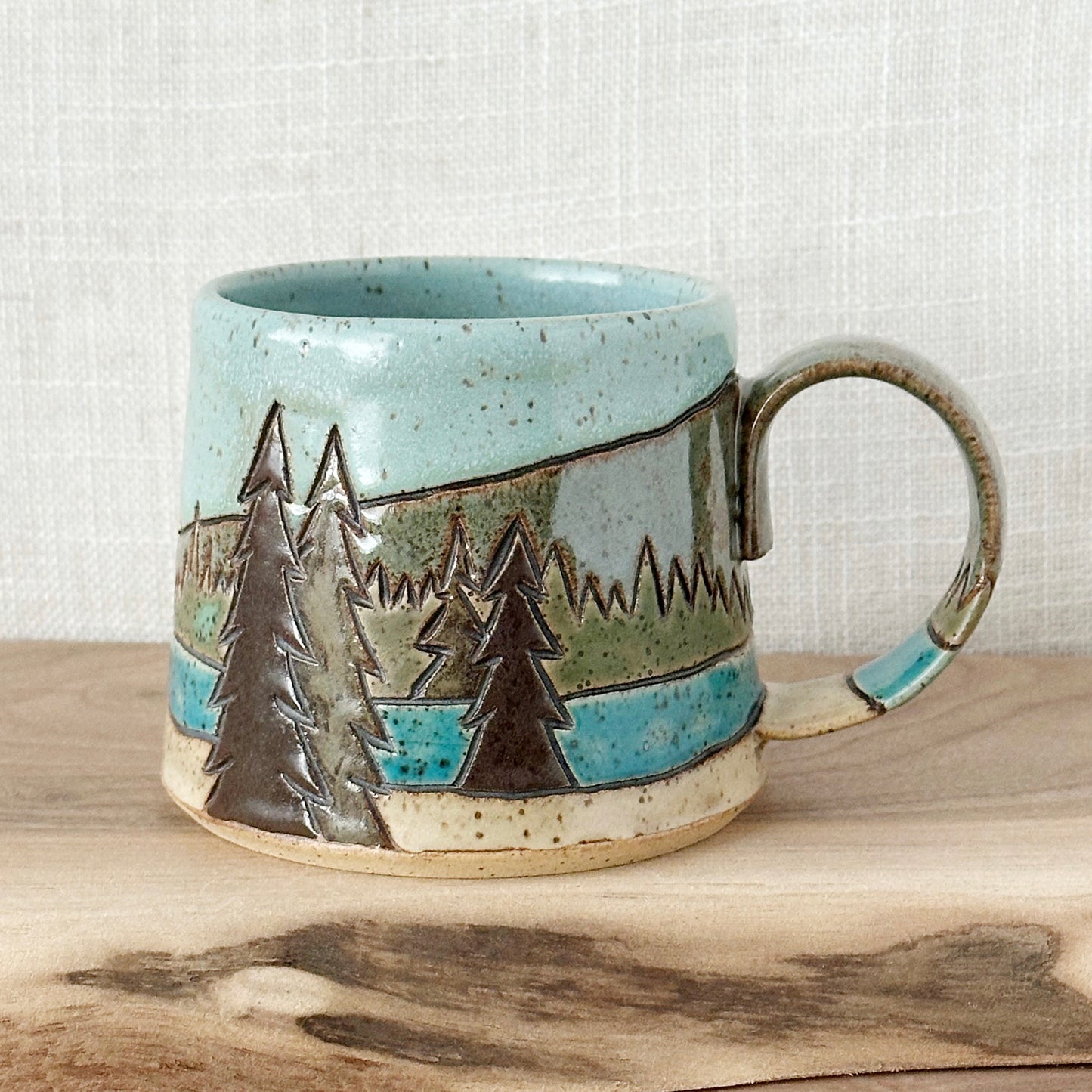 orange tent mug - left orientation (12 oz)